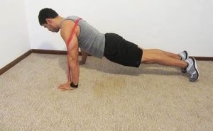 Small resistance band loop Planks