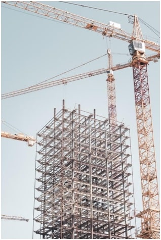 Huge cranes operating at a construction site