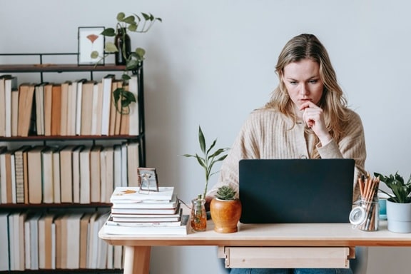 A woman looking up SEO services